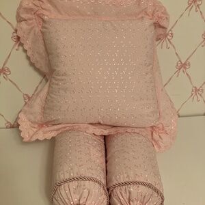 Three beautiful eyelet pillows.